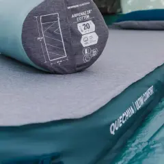 Matelas autogonflant Quechua Arpenaz, prêt à l'emploi. Facile à comment gonfler un matelas autogonflant pour un confort optimal en camping.